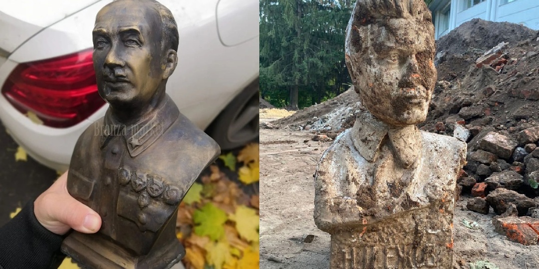 Памятники Ягоде и Ежову. Почему-то видно только одну руку