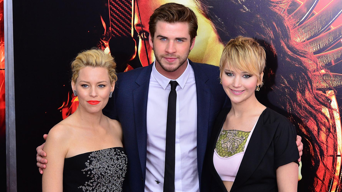    Элизабет Бэнкс, Лиам Хемсворт и Дженнифер Лоуренс. Фото: Getty Images