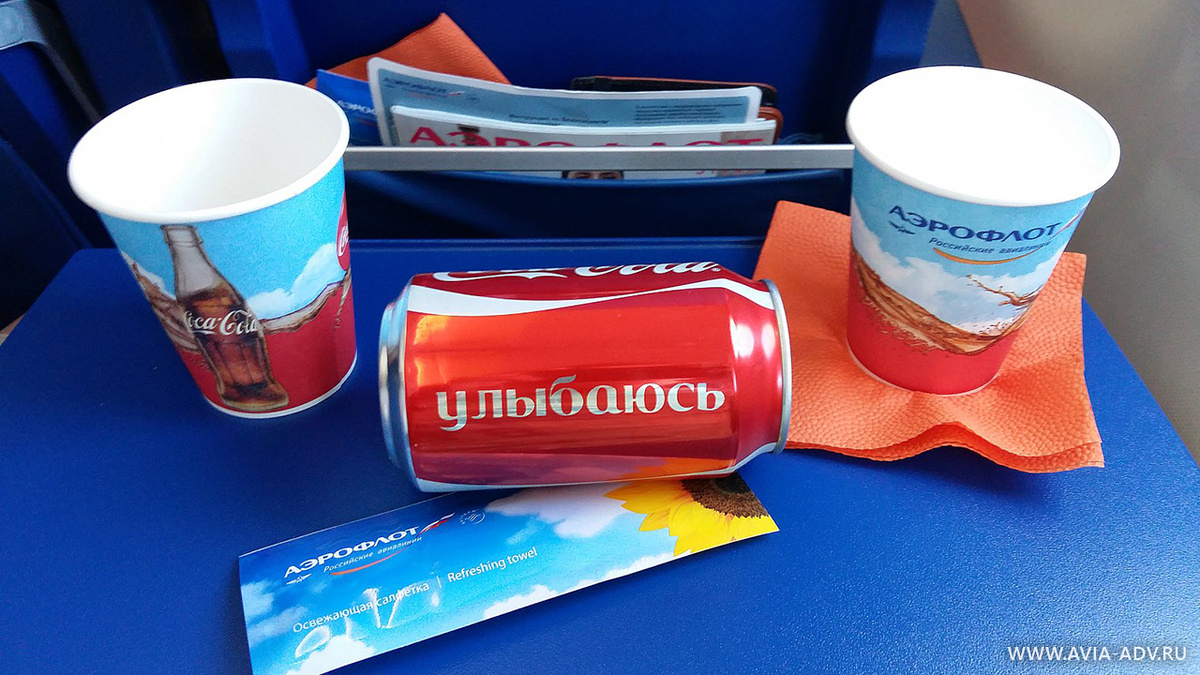 Реклама на бумажных стаканчиках, бортовой журнал, раскладка полиграфии в карманы кресел