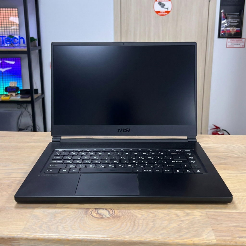 Аккумулятор вздулся настолько сильно, что начал выламывать тачпад изнутри, образовав бугор под топкейсом