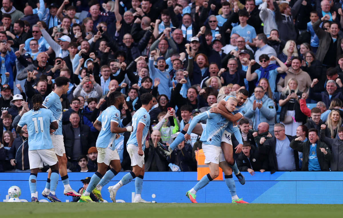    Футболисты "Манчестер Сити"  Carl Recine/Getty Images
