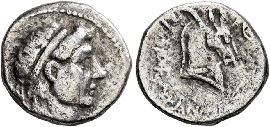 Изображение аналогичной древнегреческой монеты с профилем Афины.