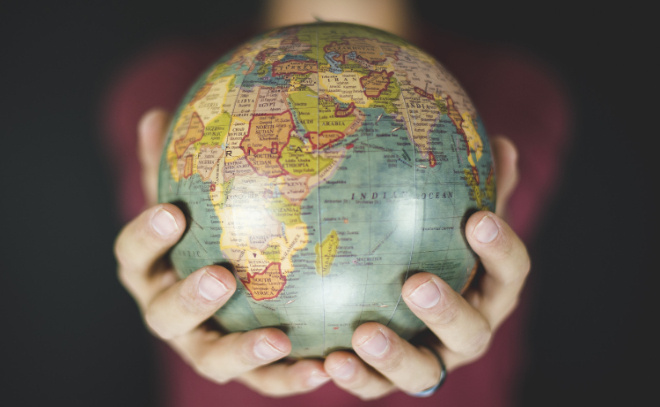    © wirestock / https://ru.freepik.com/free-photo/closeup-shot-person-holding-small-globe-with-two-hands_9282643.htm