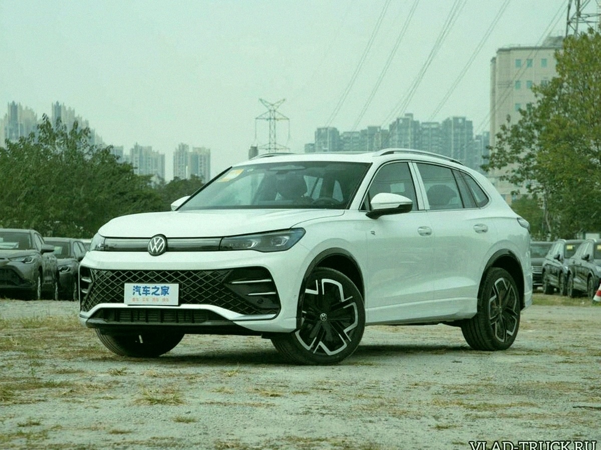 Именно такие машины сейчас едут в Россию. Tiguan L, собранный для китайского рынка. Тот же VW, но без официальной поддержки.
