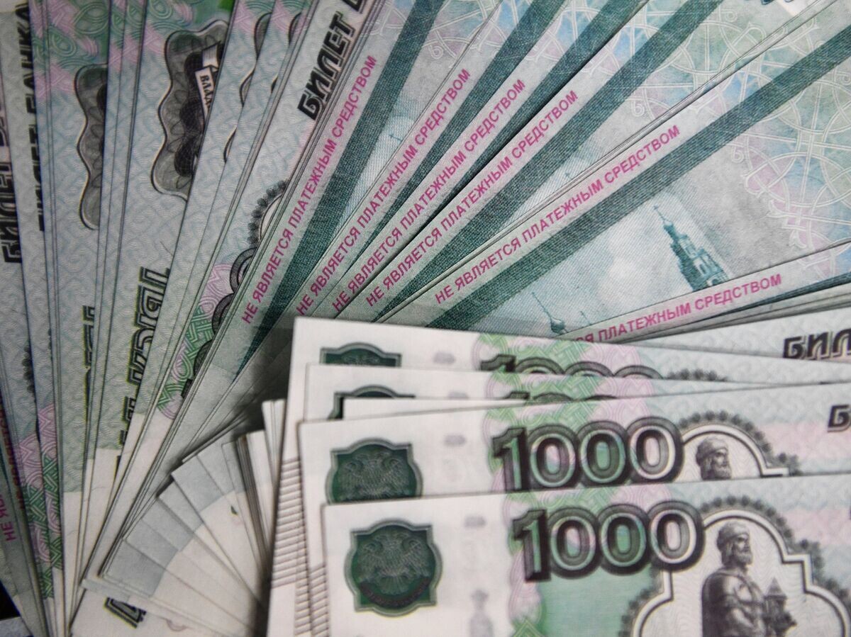    Денежные купюры© РИА Новости . Павел Лисицын