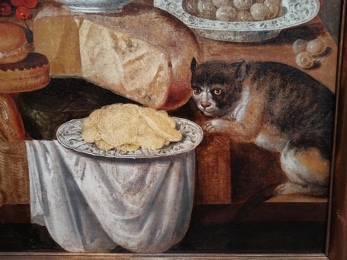 Артур Классенс "Большой банкетный стол с лобстером, фруктами, бокалом с вином, фарфоровыми и оловянными блюдами, птицами, обезьяной, белкой и кошкой" (фрагмент картины), 1625-1644 