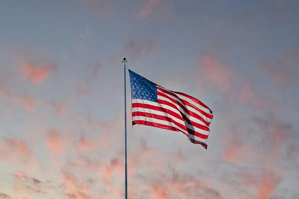    Государственный флаг США. © unsplash.com / iStrfry, Marcus