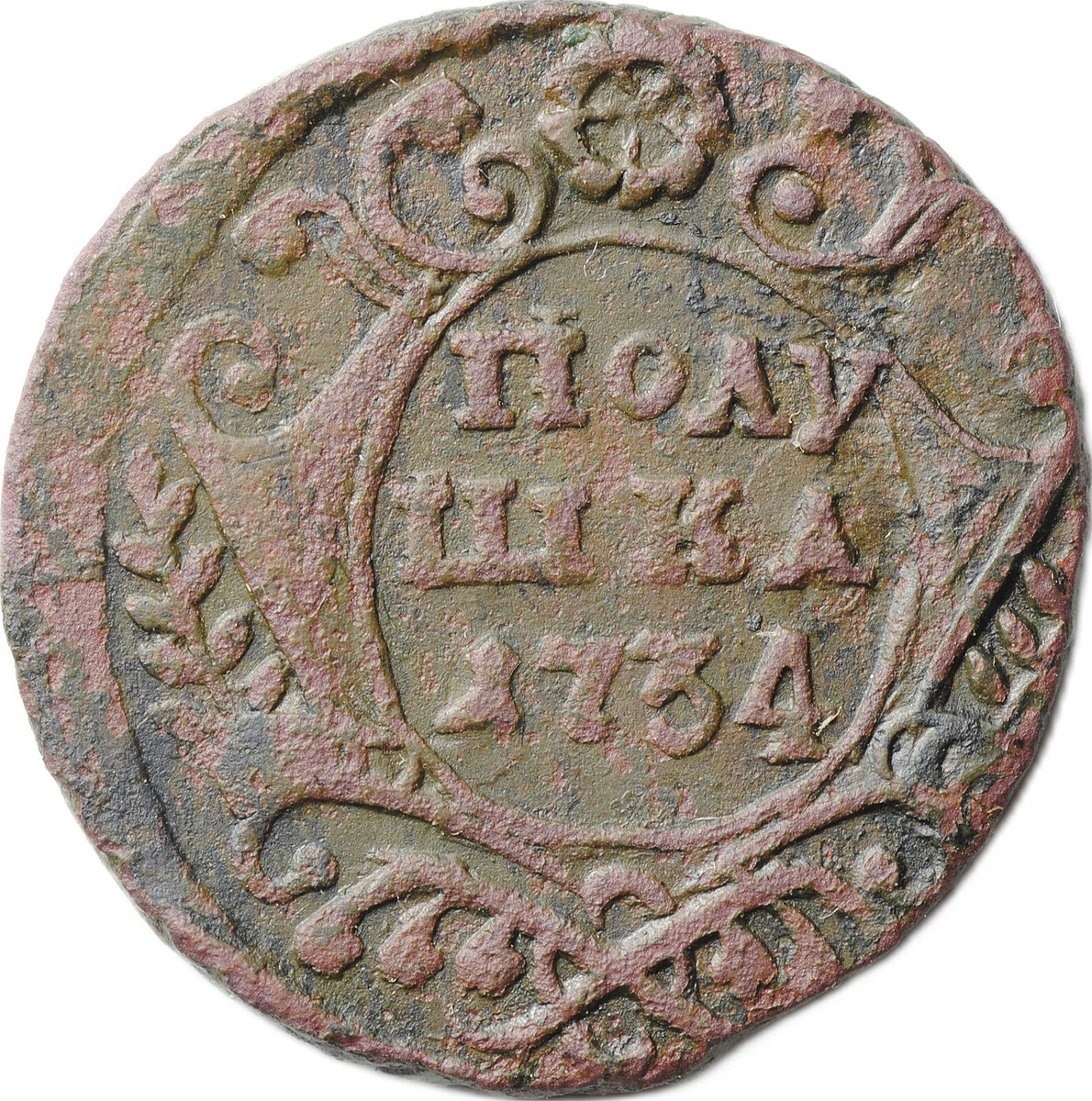 Полушка 1734 года. Общий вид полушки времён Анны Иоанновны. На лицевой стороне — упрощённый двуглавый орёл. На оборотной — фигурный картуш с надписью "ПОЛУШКА" и годом