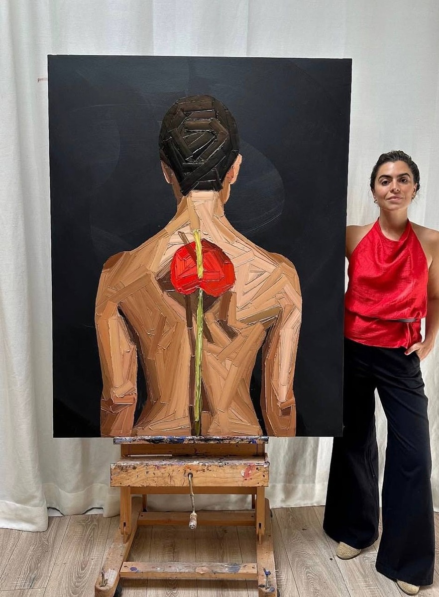   Художница со своей картиной. Изображение взято с https://www.artsy.net