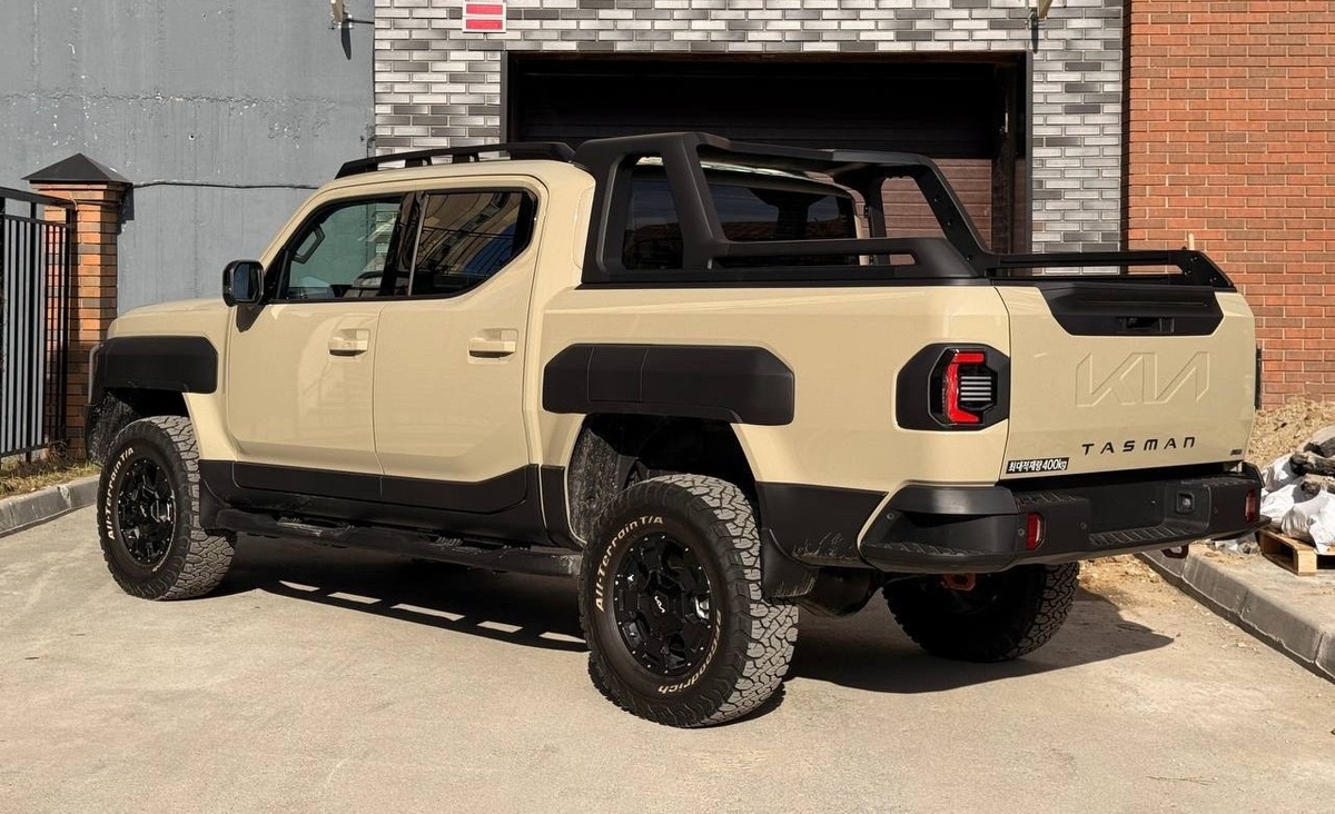 KIA TASMAN в профиль, задняя часть