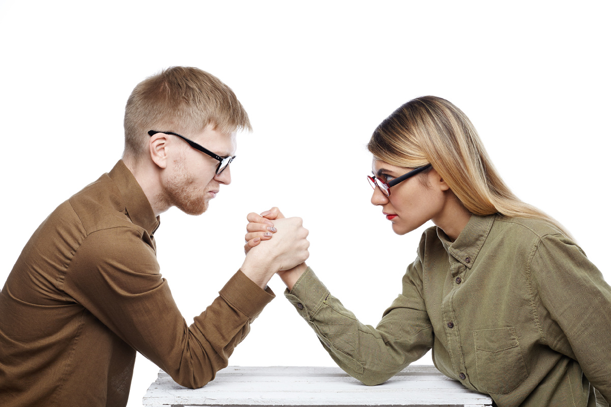 <a href="https://www.magnific.com/free-photo/people-teamwork-cooperation-competition-concept-side-view-young-female-bearded-male-colleagues-both-wearing-glasses-arm-wrestling-staring-each-other-with-confident-determined-looks_11194574.htm">Image by shurkin_son on Magnific</a>