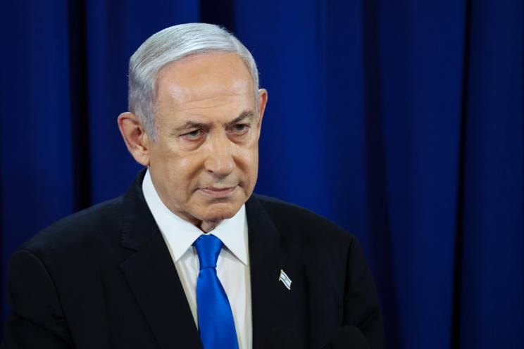    Israeli Prime Minister Benjamin Netanyahu pauses as he speaks during a press conference in Tel Aviv, Israel, Saturday July 13, 2024. (Nir Elias/Pool Photo via AP) David Harutunov