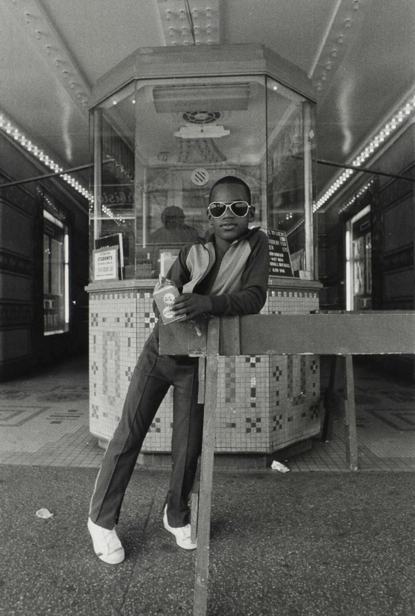 Dawoud Bey ─ A Boy in Front of the Loew’s 125th Street Movie Theater, Harlem, NY, 1976