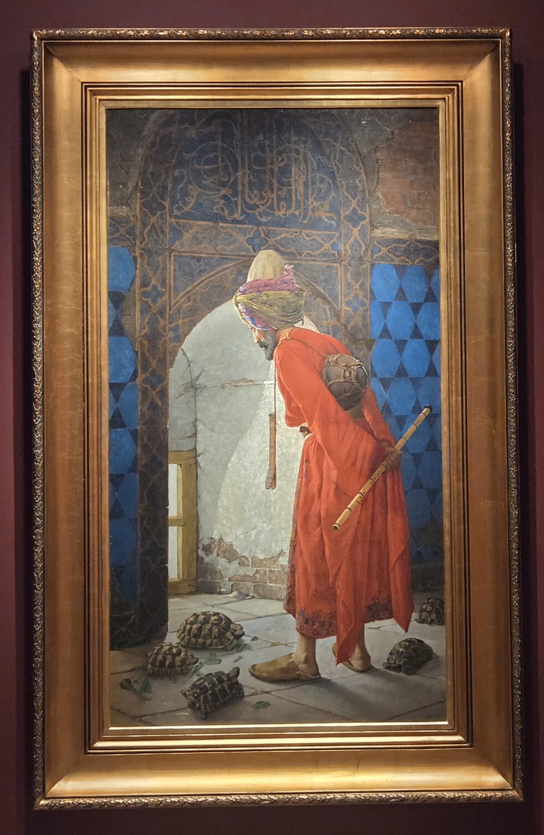Осман Хамди-Бей. «Дрессировщик черепах»,1906-1907 гг.. Холст, масло. Размеры 221,5 × 120. Pera Museum. Стамбул.