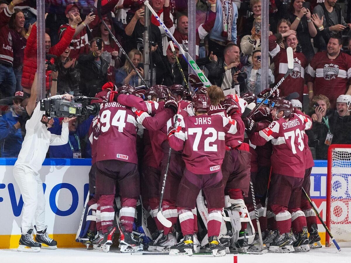    Хоккеисты сборной Латвии | © Фото : Пресс-служба IIHF
