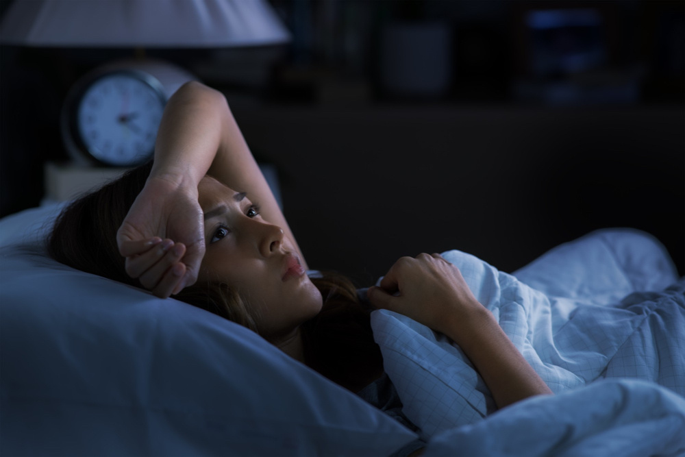https://www.magnific.com/premium-photo/depressed-young-woman-lying-bed-cannot-sleep-from-insomnia_11985149.htm