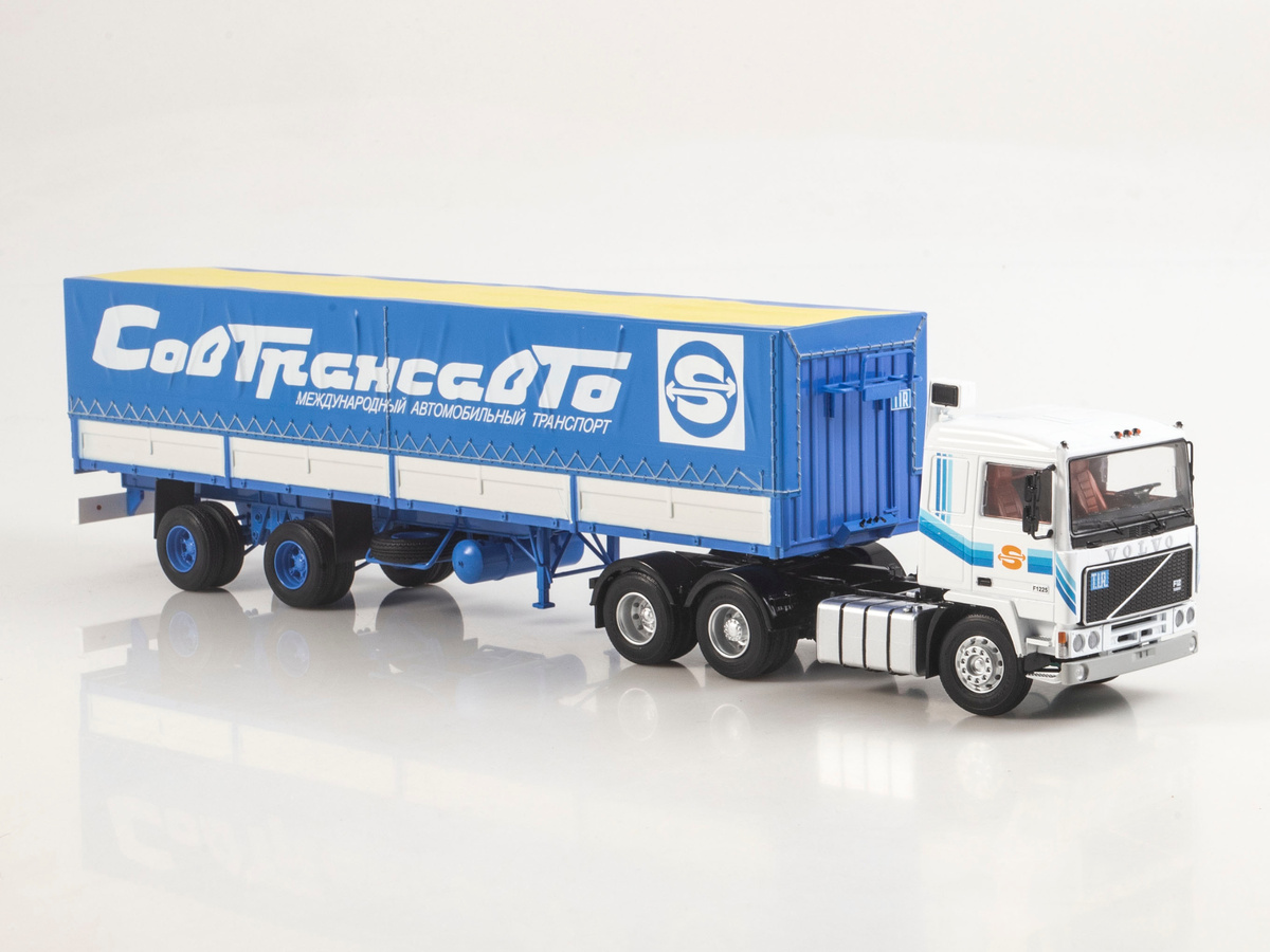 Седельный тягач 6х2 Вольво, Volvo F12, белый, с тентованным полуприцепом Fruehauf Savoyarde, Sovtransavto