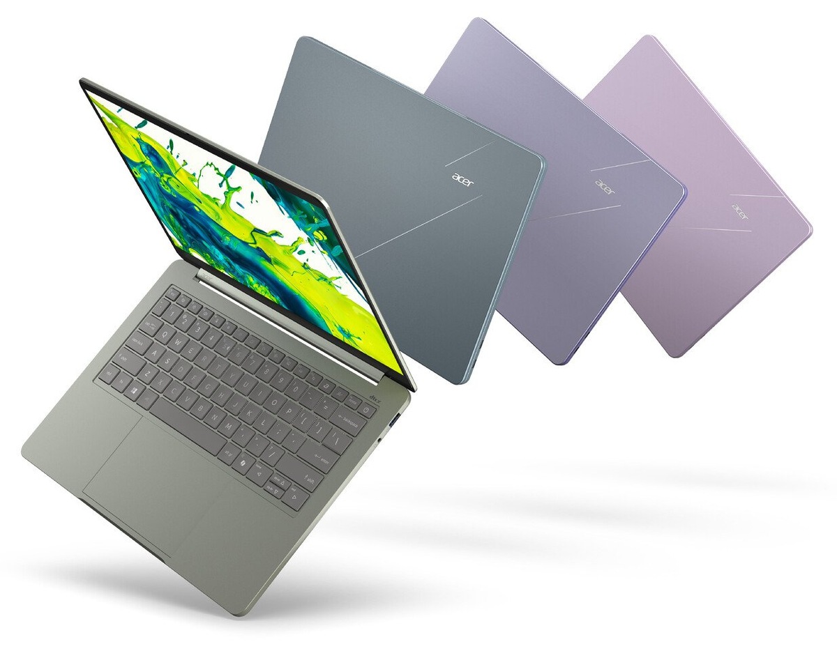    Gray Acer laptop open with a vibrant display, shown with three colored lid variants (blue, lavender, pink) fanned behind it in a diagonal layout.