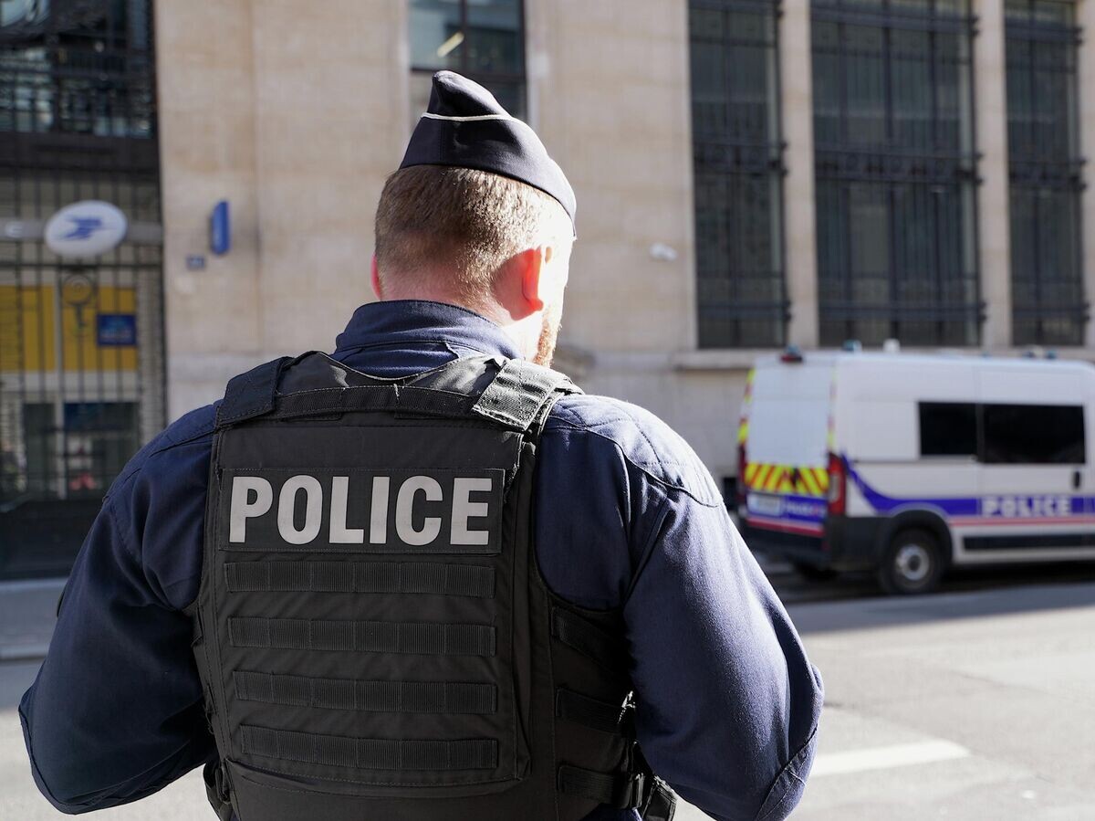    Сотрудник полиции в Париже | © AP Photo / Nicolas Garriga