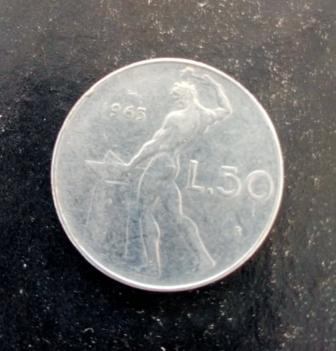 Аверс монеты 50 лир 1963г Италия.