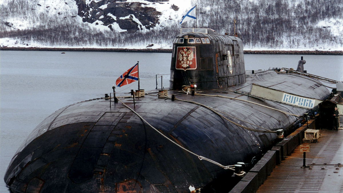 Российский атомный подводный ракетоносный крейсер К-141 «Курск». В 1995 г. подлодка вошла в состав Северного флота, базировалась в Видяево (Мурманская область). Источник изображения: lenta.ru