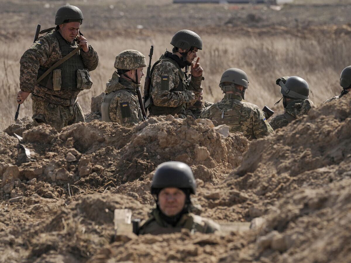    Украинские военнослужащие | © AP Photo / Vadim Ghirda