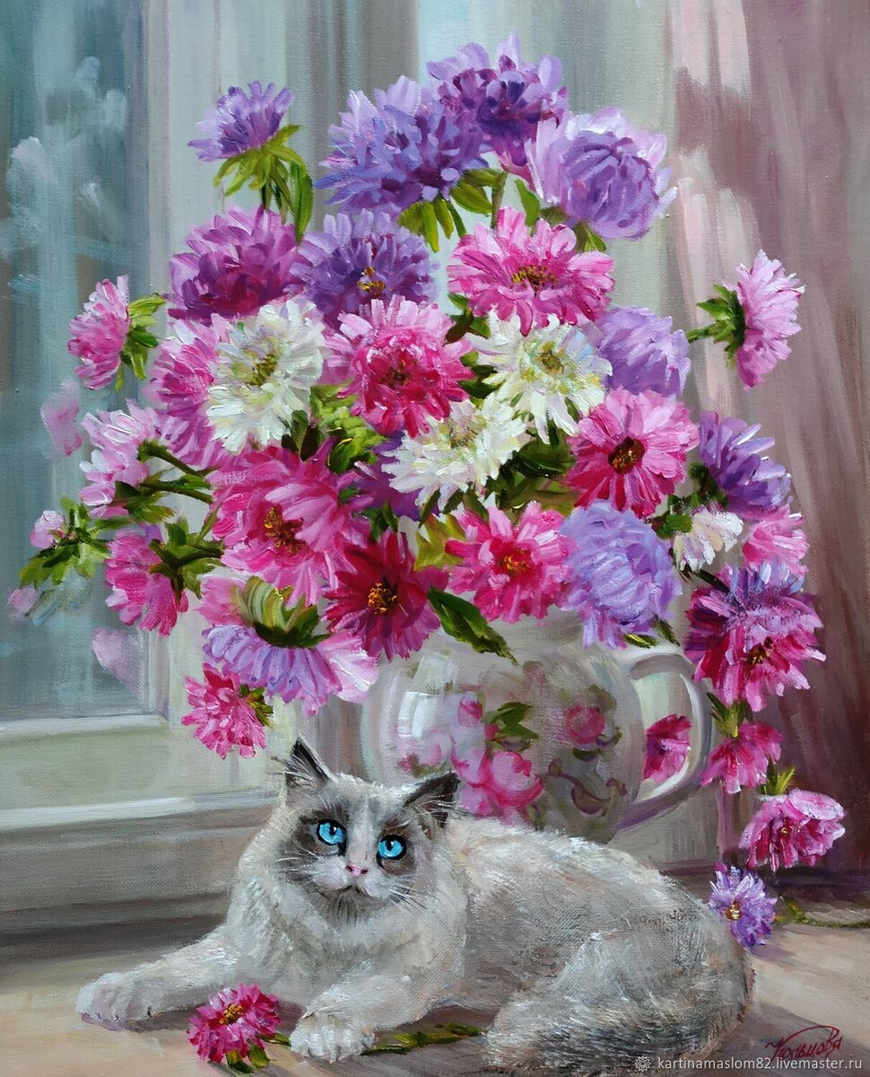 Котёнок среди цветов