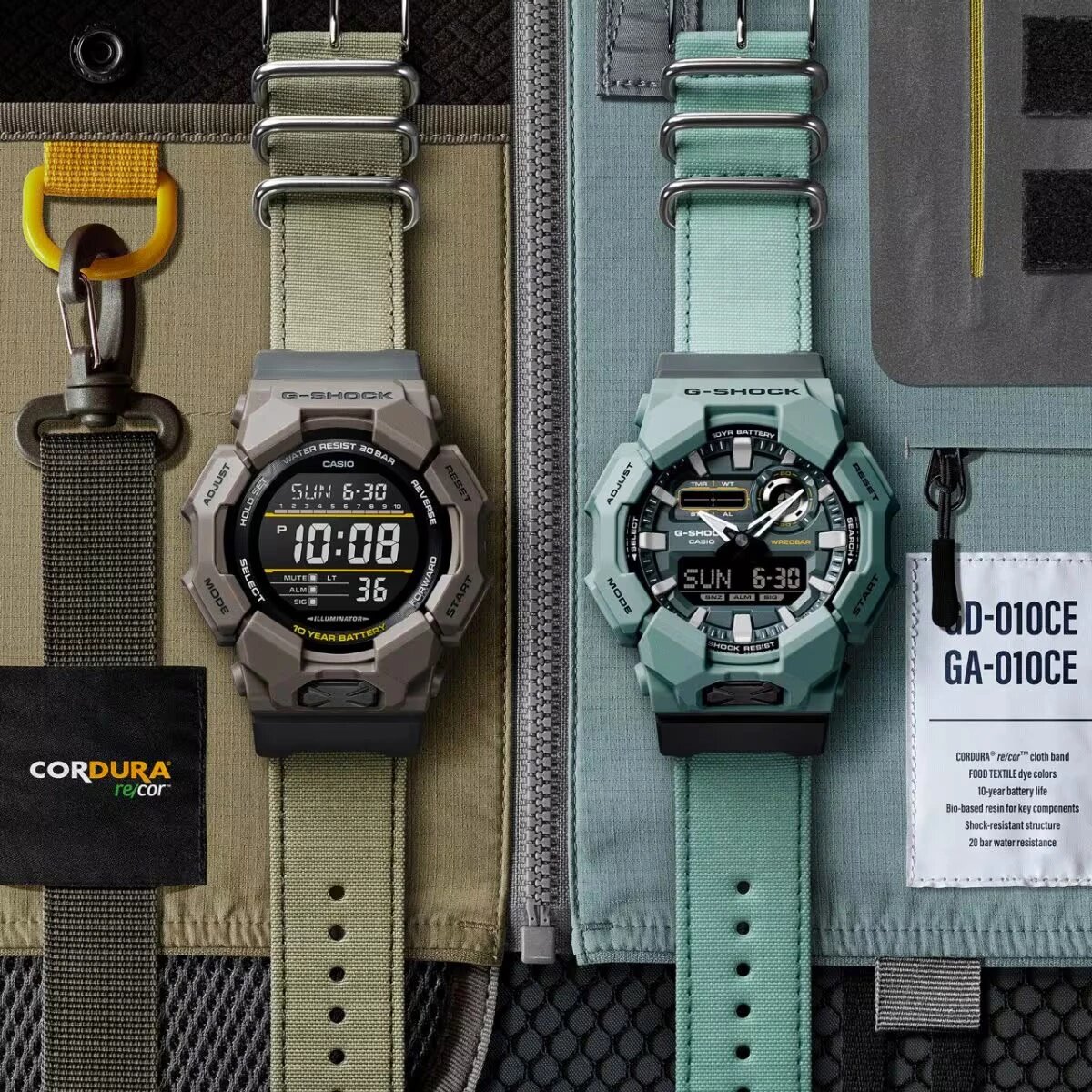 Главные отличия часов G-Shock GD-010CE-5E - батарея на 10 лет и текстильный ремешок Cordura. Здесь модель рядом с еще одними часами на таком же тканевом ремешке, но другого цвета — G-Shock GA-010CE-2A