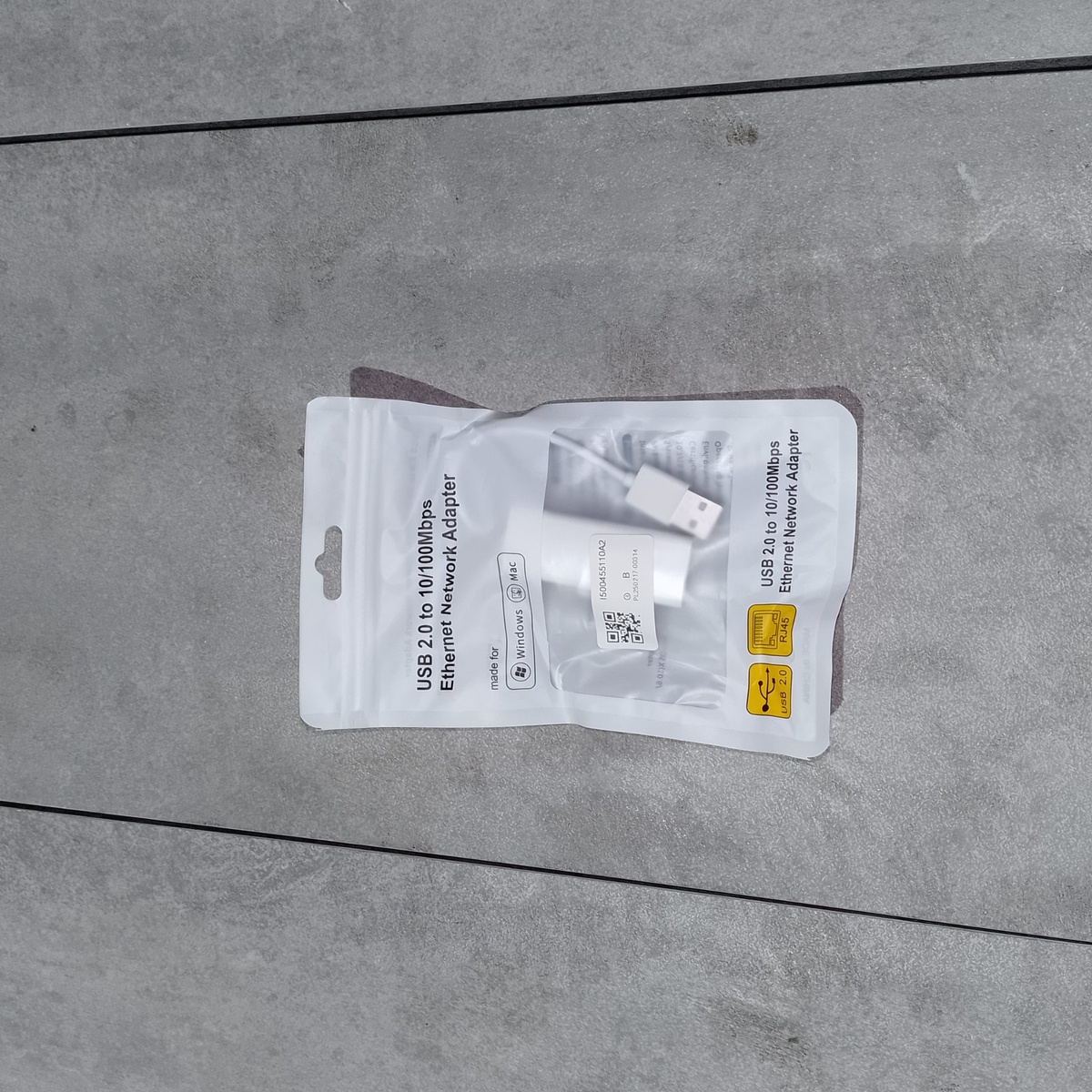    На лицевой стороне упаковки указано назначение: USB 2.0 to 10/100 Mbps Ethernet Network Adapter.