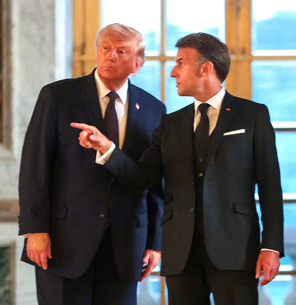    Эмманюэль Макрон и Дональд Трамп. REUTERS