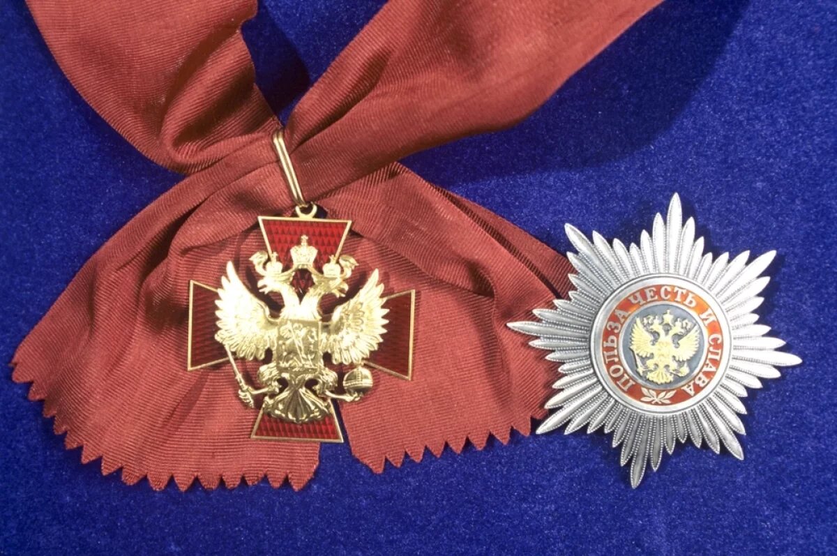    Знак и звезда ордена «За заслуги перед Отечеством» I степени