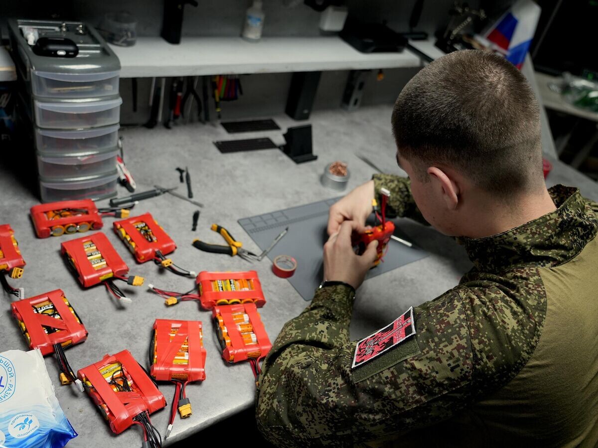   Боец за работой | © РИА Новости / Марикян Мария