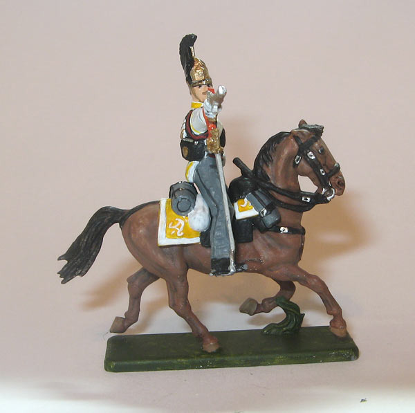 Астраханский кирасир на коне с пистолетом. Военная миниатюра. Масштаб: 1:72. Из комментариев: "Кроме того, я дополню список недочетов: отделка вальтрапа - по краю должна идти тонкая линия полкового цвета...это как минимум. Минимум потому что есть пример (на фото) отделки вальтрапа в Астраханском кирасирском полку. Здесь как будто ажно две линии приборного цвета. Сложно нарисовать такое или несложно не знаю, но если уж с претензией на историчность, то думаю надо выполнять". "Автор перепутал полностью стальные ножны кирасирских палашей с ножнами кавалерийской сабли обр. 1809, с металлическим прорезным прибором". "По поводу чепрака Астраханского кирасирског полка (фото из "Старого Цейхгауза") рискну высказать крамольную мысль - а нижних ли он чинов? Выкладка не из сукна, а из басона. Думаю здесь не обойтись без консультации людей более сведущих". Ссылка: https://diorama.ru/gallery/training/1887/ Для справки: При общей кирасирской форме Астраханский полк имел желтый приборный цвет и белый приборами металл. Правки: "цвет выпушки, вальтрапов, воротников и обшлагов рукавов - желтый, цвет приборного металла - белый". Для справки: 12.10.1811 — генерал-майором Бороздиным 2-м в м. Усвяты Велижского уезда Витебской губернии сформирован Астраханский кирасирский полк в составе 5-ти эскадронов. Ссылка: https://dzen.ru/a/aYIng4VD4jew1xtD Для справки: В 1812 г. генерал-майор Николай Михайлович Бороздин 2-й был командиром 1-й бригады 1-й кирасирской дивизии генерал-майора Н. И. Депрерадовича в составе 1-й Западной армии под руководством генерала от инфантерии Михаила Богдановича Барклая де Толли. Ссылка: https://dzen.ru/a/ajldTVIL32uLYT0D