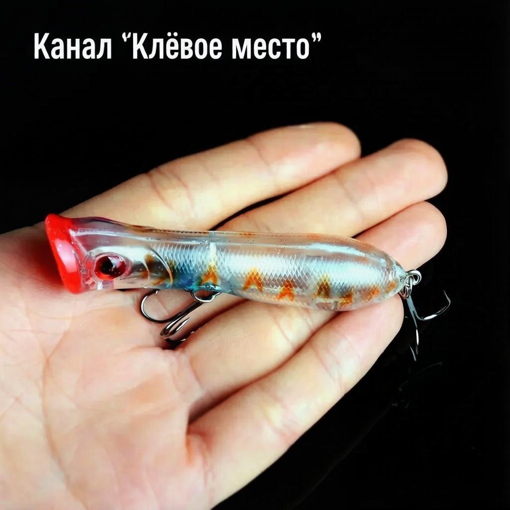 Поппер Fishycat Popcat 85F в руке рыболова