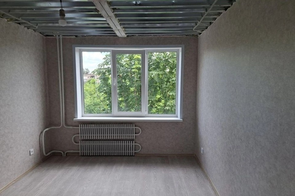    Строители из Кузбасса завершают восстановление многоквартирного дома в Горловке. Фото: Администрация Горловки