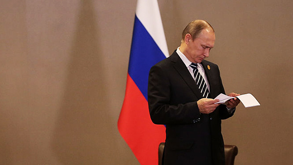    ANTALYA, TURKEY - NOVEMBER 16: Russian President Vladimir Putin waits for the arrival of British Prime Minister David Cameron ahead of their bilateral meeting on day two of the G20 Turkey Leaders Summit on November 16, 2015 in Antalya, Turkey. World leaders will use the summit to discuss issues including, climate change, the global economy, the refugee crisis and terrorism. The two day summit takes place in the wake of the massive terrorist attack in Paris which killed more than 120 people. (Photo by Chris McGrath/Getty Images)