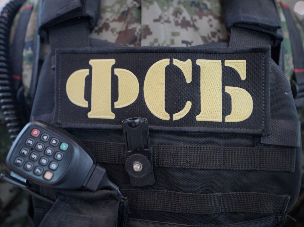    Бронежилет и рация сотрудника ФСБ РФ | © РИА Новости / Евгений Биятов