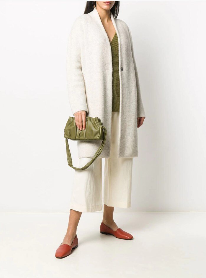www.farfetch.com