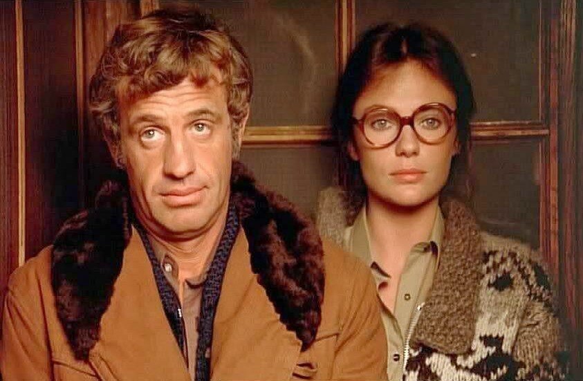 Кадр из фильма “Великолепный”, Ж-П Бельмондо в роли Франсуа Мерлена и Жаклин Биссет в роли Кристин