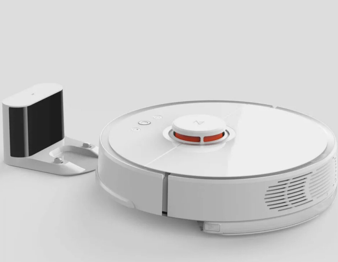 Робот-пылесос с функцией влажной уборки. В правой части внизу - контейнер для воды 