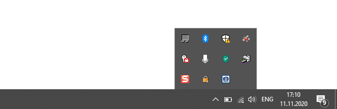 Внизу экрана, справа. Иконки находятся либо на Панели, либо под стрелочкой
