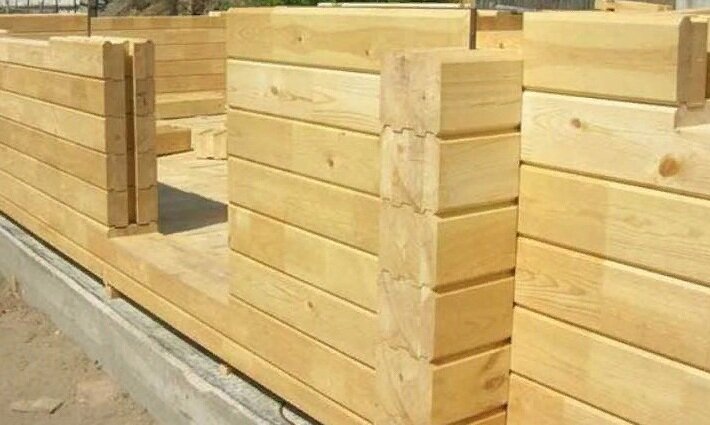                                                                 Стена дома из бруса