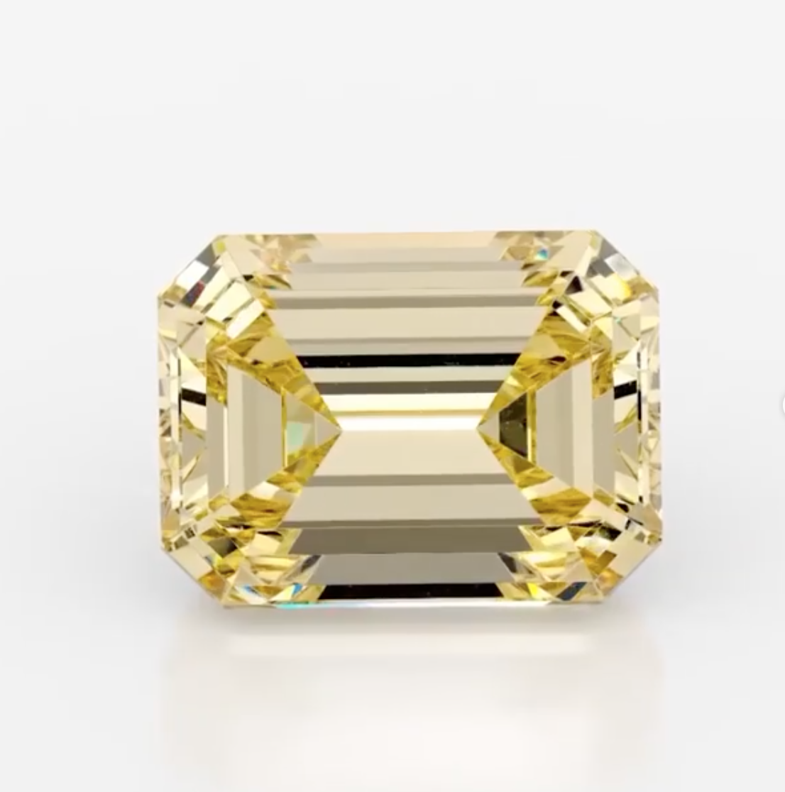 Бриллиант в изумрудной огранке, цвет Fancy Yellow 