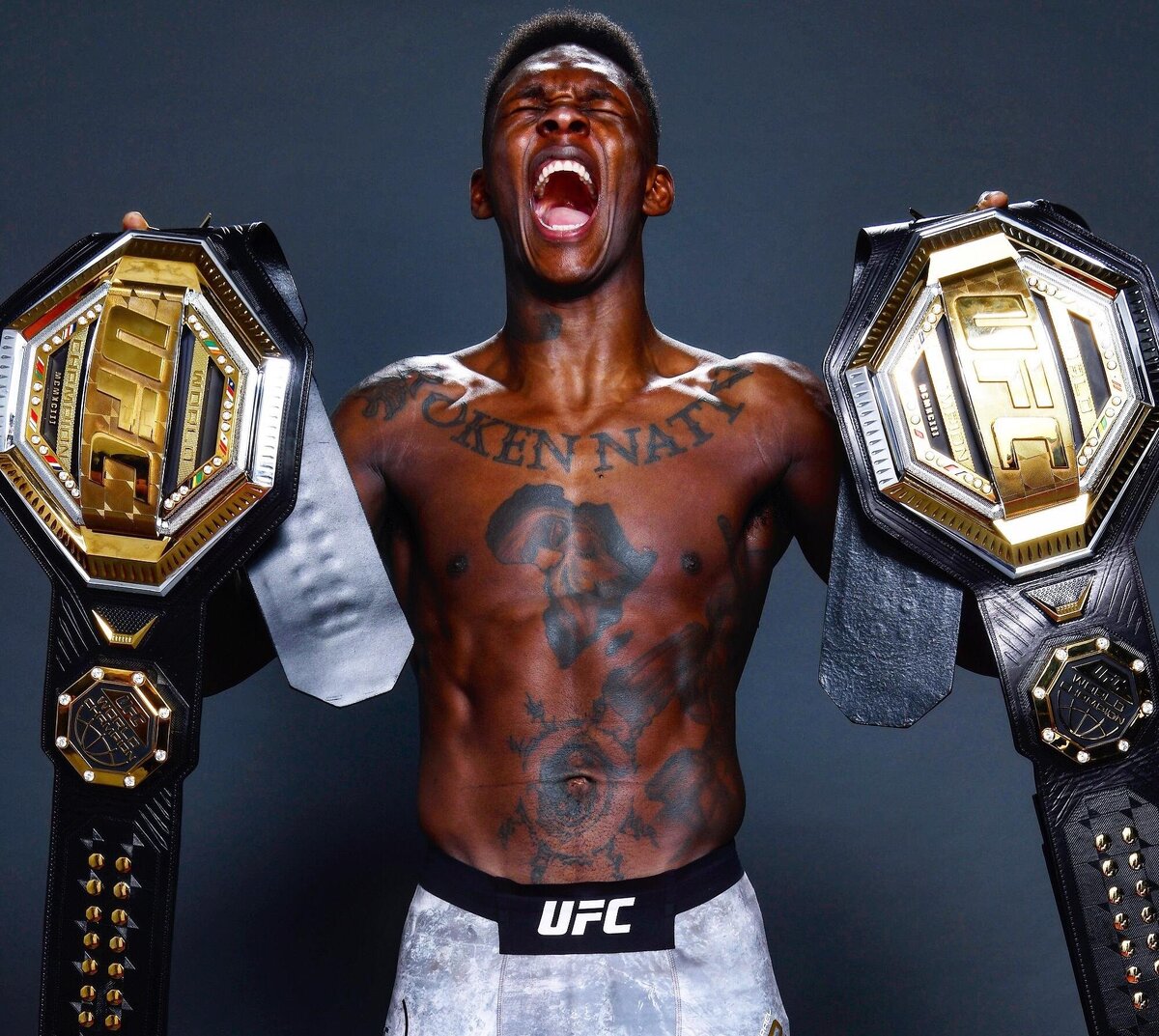 Исраэль Адесанья. Фото взято из источника: https://www.google.com/url?sa=i&url=https%3A%2F%2Fallboxing.ru%2Fnews%2F20191008-1148%2Fsonnen-habib-i-adesanya-krupneyshie-zvezdy-ufc&psig=AOvVaw26Wi33kACpTVLvZ0H5L-KX&ust=1629396924541000&source=images&cd=vfe&ved=0CAsQjRxqFwoTCLjWut-Wu_ICFQAAAAAdAAAAABAN