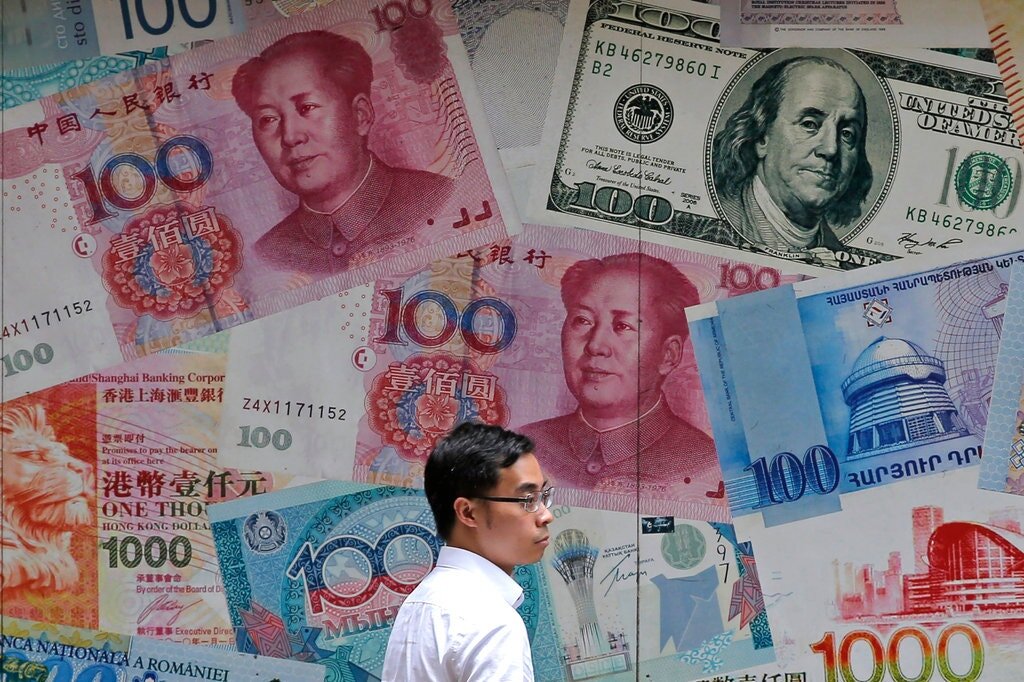 Фото взято с сайта: https://www.nytimes.com/2019/08/04/business/china-yuan-renminbi-7.html