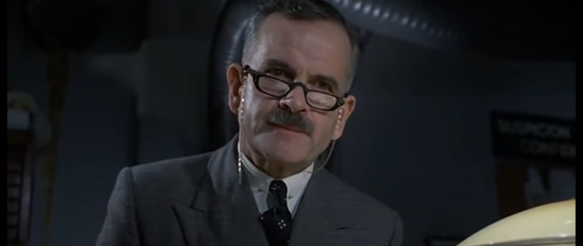 В роли мистера Курцмана (кадр из фильма "Бразилия")