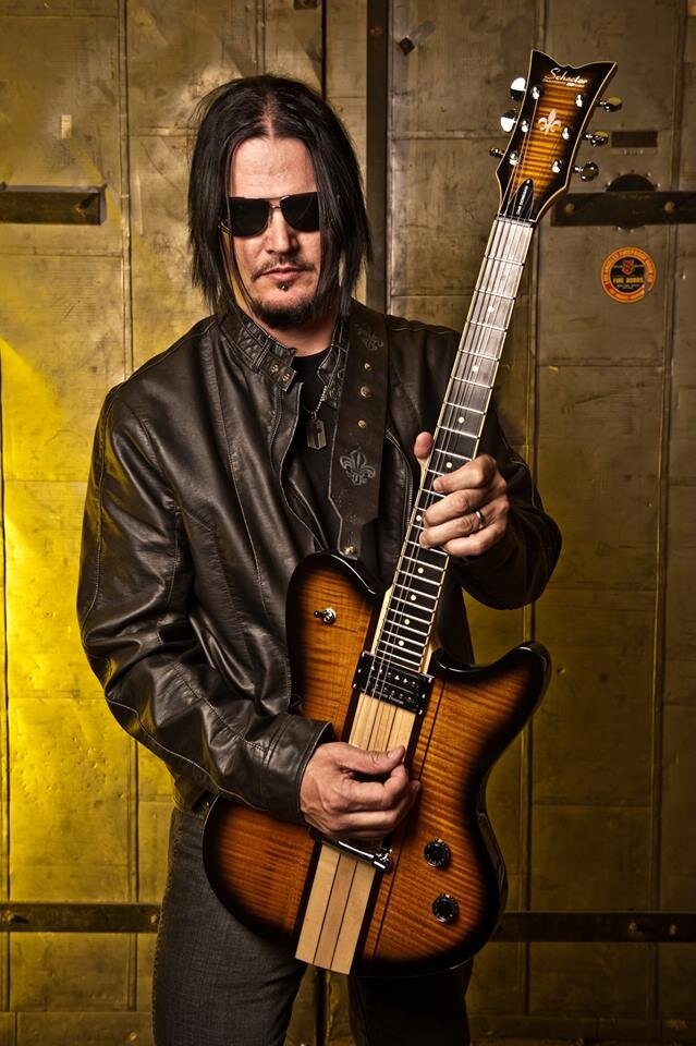 Дэн Дониган гитарист