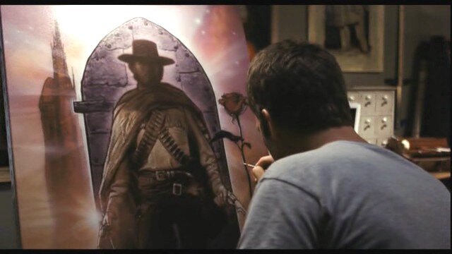 Кадр из фильма "Мгла", на картине - Роланд Дискейн, роза и башня за спиной