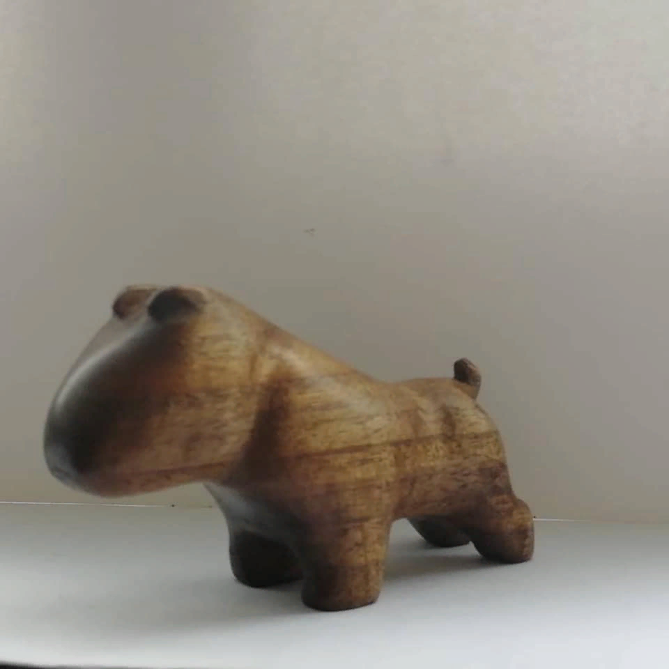 из дерева амазаку (статуэтка), охраняет мой комп :-)