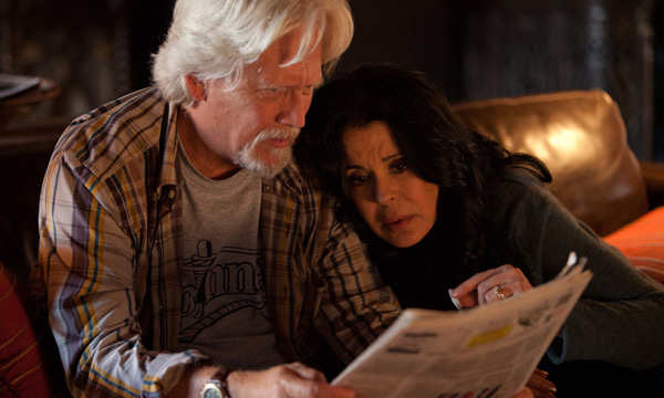 Брюс Дэвидсон и Мария Кончита Алонсо в фильме «Повелители Салема». Кадр из фильма